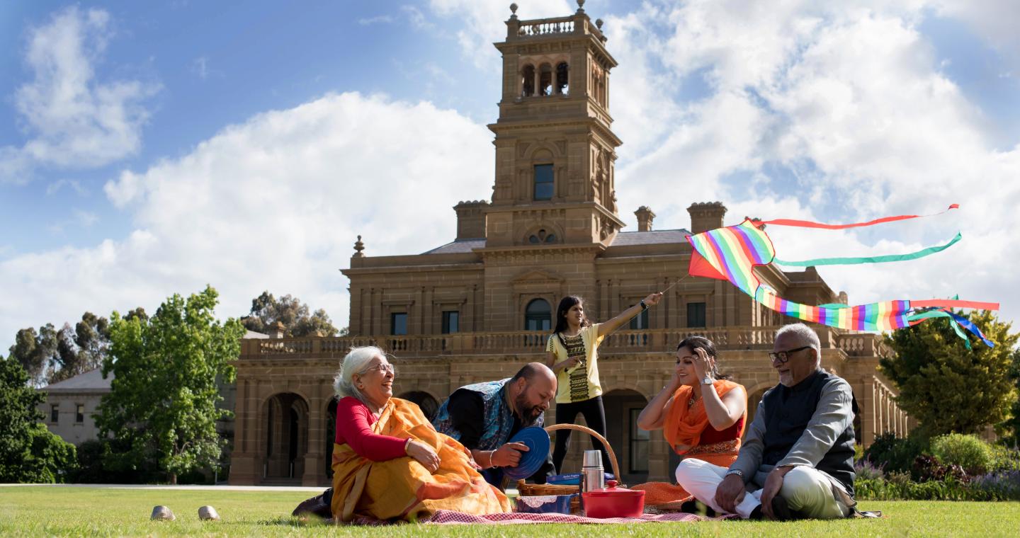 Family having a picnic at Werribee Park Mansion