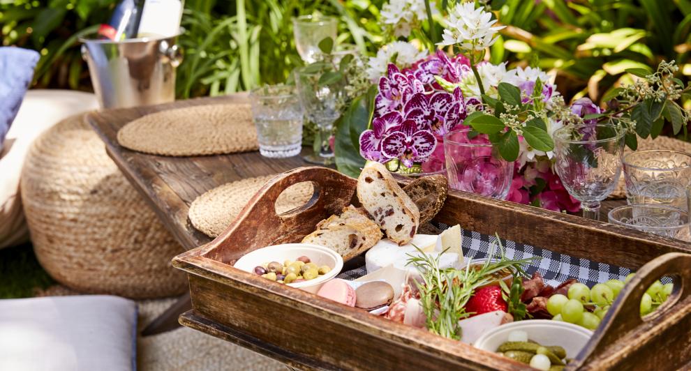 a picnic tray with picnic food set up on a low table at The Refectory Parlour